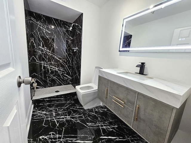 full bathroom with toilet, marble finish floor, a marble finish shower, and vanity