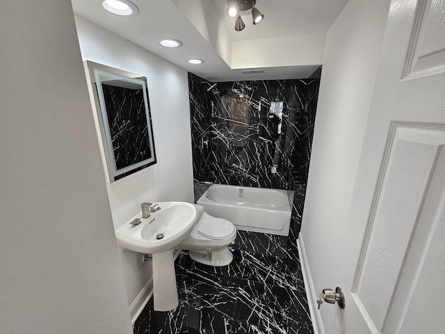 full bath featuring shower / washtub combination, recessed lighting, marble finish floor, and toilet