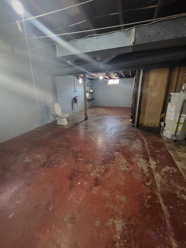 basement featuring water heater