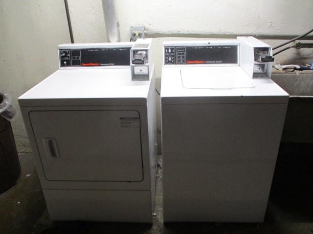 common laundry area with washer and dryer