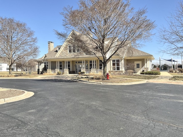 1315 Stonecrop Ln, Joliet, IL 60431 - view of front of property with a chimney and a porch