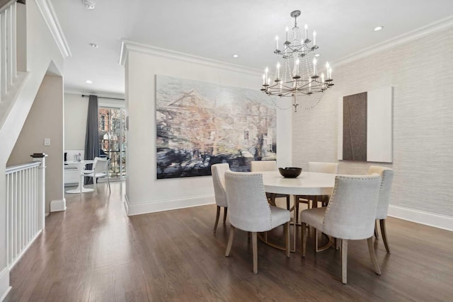 dining area featuring baseboards, ornamental molding, wood finished floors, a chandelier, and recessed lighting