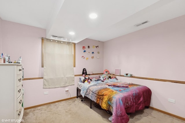 bedroom with carpet, visible vents, and baseboards