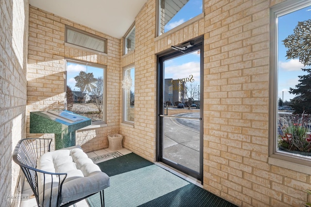 doorway with brick wall