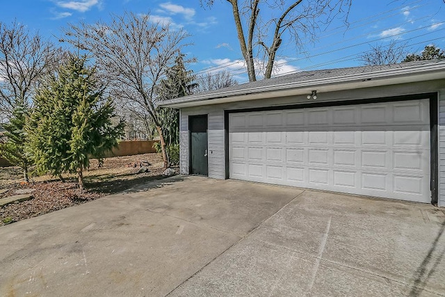 detached garage with fence