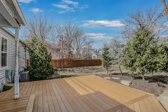 deck with central air condition unit and fence