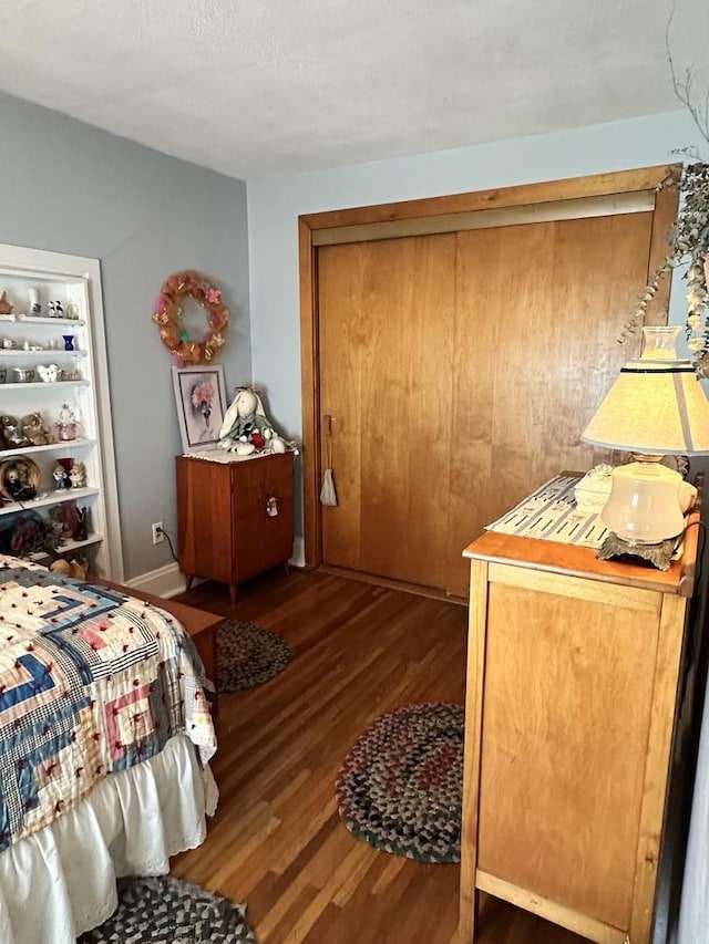 bedroom featuring wood finished floors