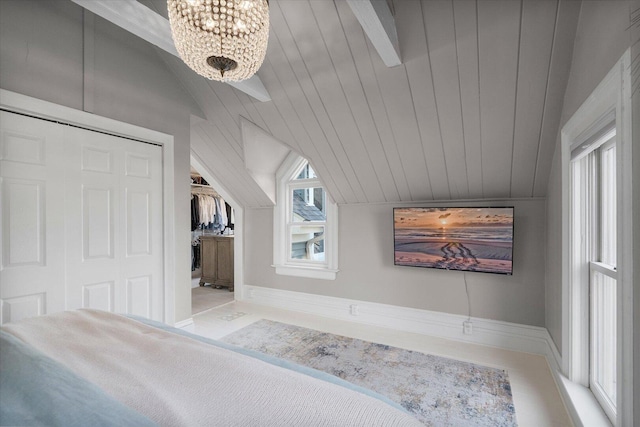 additional living space with wood ceiling, baseboards, vaulted ceiling, and a notable chandelier