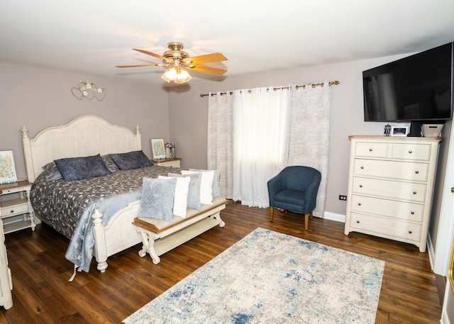 bedroom with ceiling fan and wood finished floors