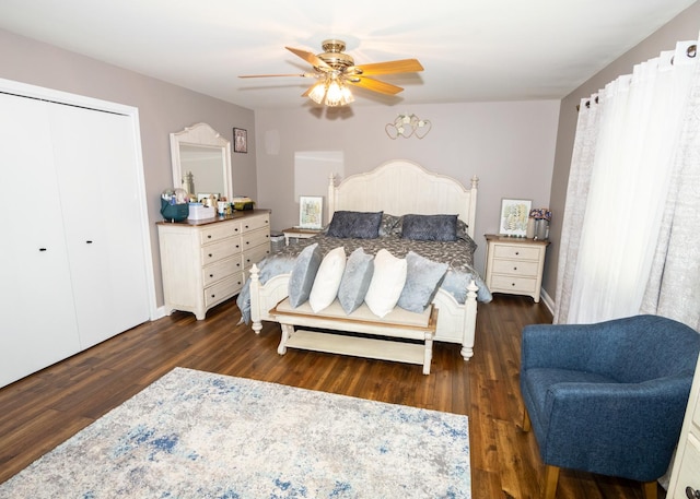 bedroom featuring a closet, wood finished floors, and a ceiling fan