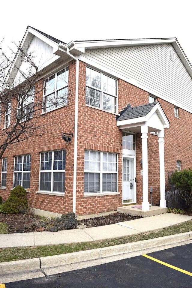 multi unit property featuring brick siding