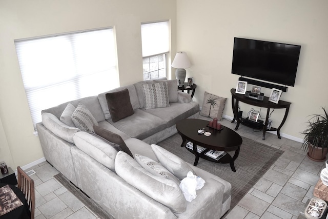 living room featuring baseboards