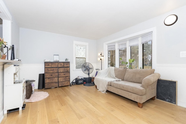 sitting room with light wood-style flooring