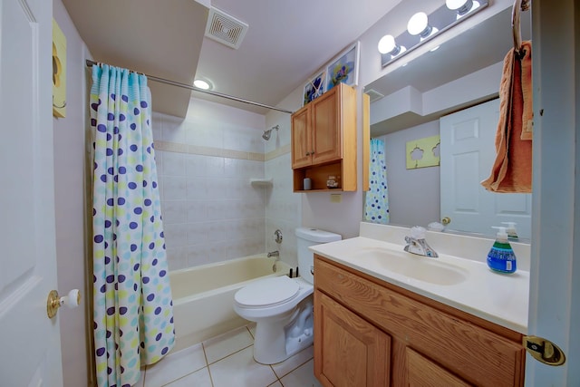 bathroom featuring tile patterned flooring, toilet, shower / tub combo, vanity, and visible vents