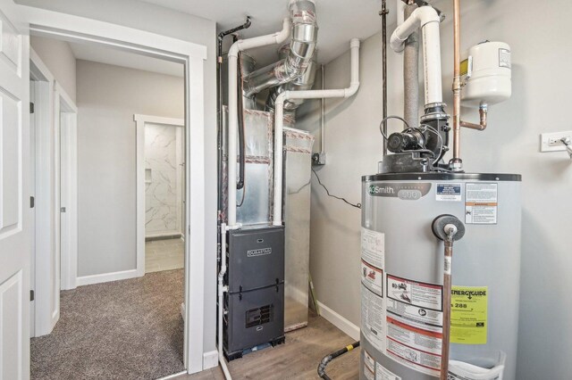 utilities featuring gas water heater and heating unit