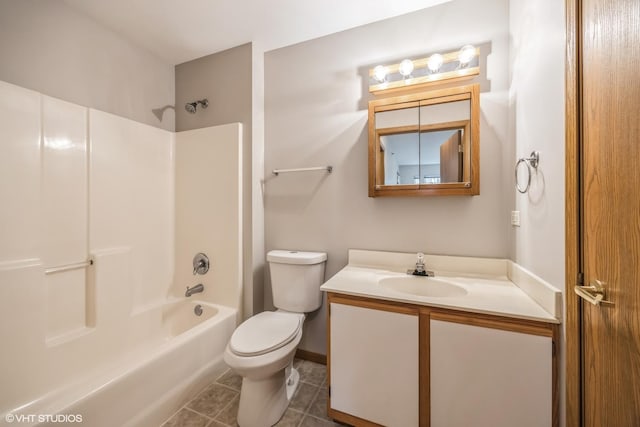 bathroom with vanity, shower / bathing tub combination, tile patterned flooring, and toilet