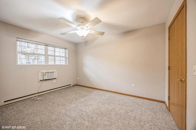 carpeted spare room with a baseboard heating unit, a wall unit AC, baseboards, and a ceiling fan