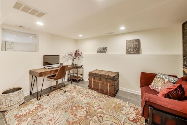 tiled office space with visible vents and recessed lighting