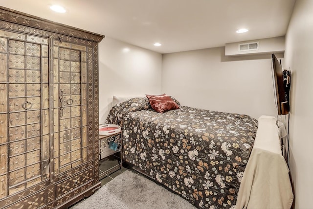 bedroom featuring visible vents and recessed lighting