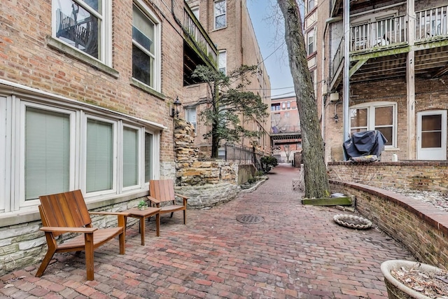 surrounding community featuring a patio area