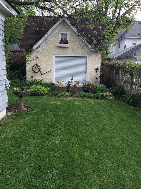 garage with fence