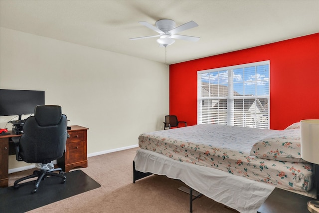 bedroom featuring a ceiling fan, baseboards, and carpet floors