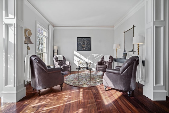 living room with dark wood-type flooring and crown molding