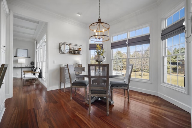 dining room featuring ornamental molding, dark wood finished floors, and a notable chandelier