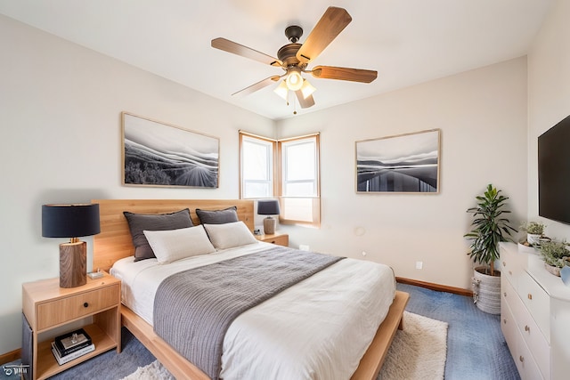 bedroom with baseboards, carpet floors, and ceiling fan