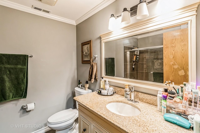 bathroom with visible vents, toilet, ornamental molding, a shower stall, and vanity