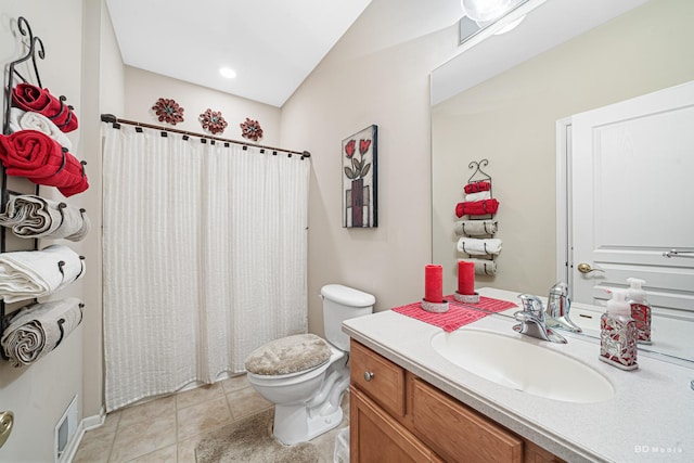 full bath with toilet, tile patterned floors, visible vents, vanity, and a shower with curtain