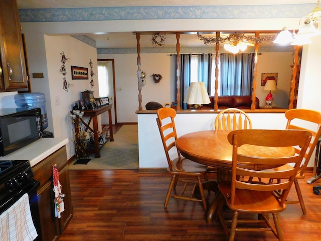 dining room with wood finished floors