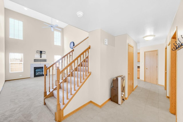 interior space featuring baseboards and stairs