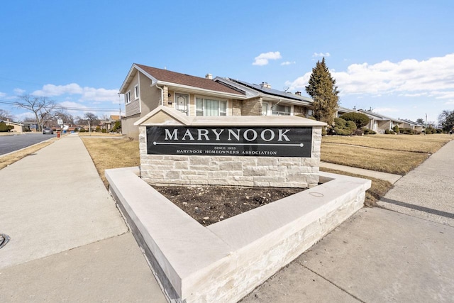 view of community sign