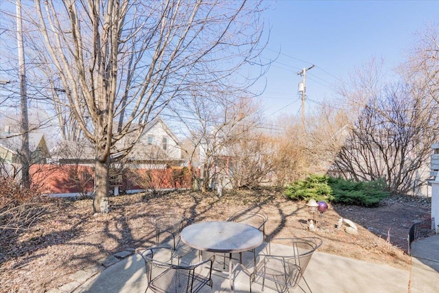 view of patio with fence