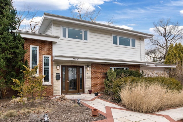 view of front of property with brick siding