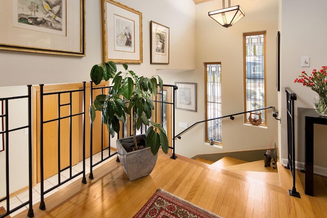 entrance foyer featuring hardwood / wood-style flooring and baseboards