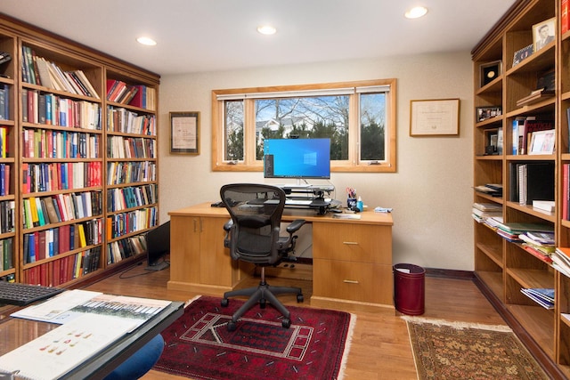 office with baseboards, wood finished floors, and recessed lighting