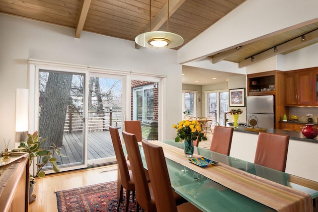 dining area featuring recessed lighting, wood ceiling, lofted ceiling with beams, and wood finished floors