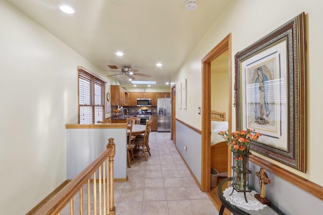 5326 S Nagle Ave, Chicago, IL 60638 - corridor with light tile patterned floors, baseboards, an upstairs landing, and recessed lighting