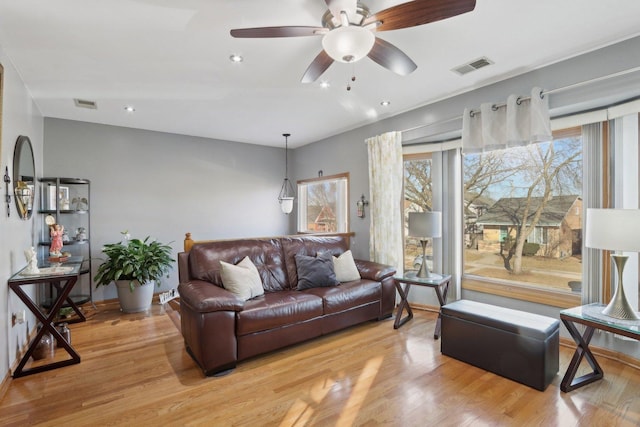 5326 S Nagle Ave, Chicago, IL 60638 - living area featuring plenty of natural light, light wood-style flooring, and visible vents
