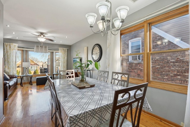 5326 S Nagle Ave, Chicago, IL 60638 - dining room with ceiling fan with notable chandelier, recessed lighting, wood finished floors, and baseboards