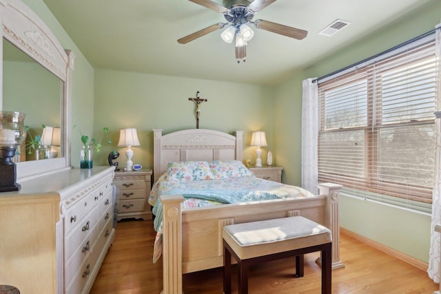 5326 S Nagle Ave, Chicago, IL 60638 - bedroom featuring light wood-style flooring, a ceiling fan, visible vents, and baseboards