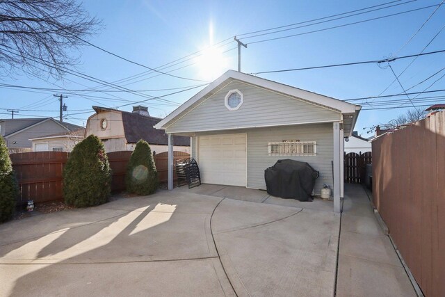 5326 S Nagle Ave, Chicago, IL 60638 - detached garage with driveway, fence, and a gate