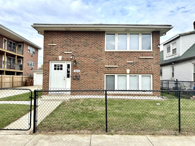 view of front of home featuring brick siding, a front lawn, and fence