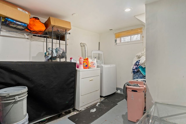 laundry room featuring washer and dryer and laundry area