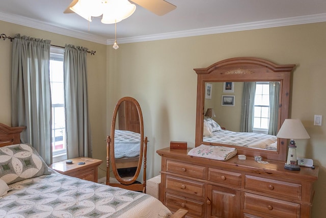 bedroom featuring ornamental molding and a ceiling fan