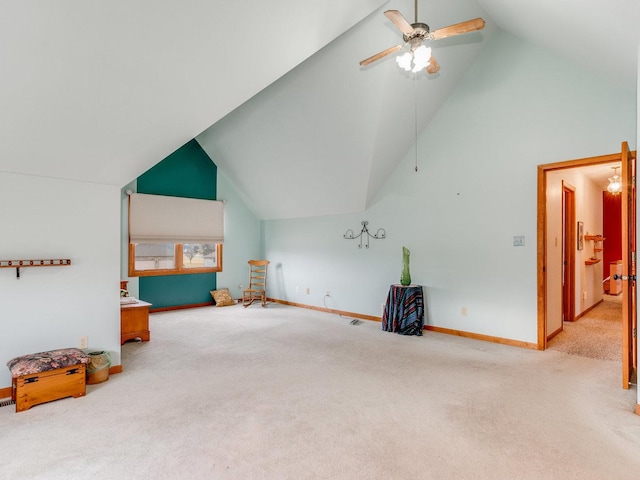 additional living space with high vaulted ceiling, carpet, baseboards, and a ceiling fan