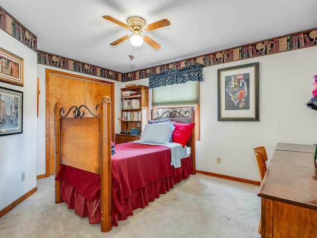 bedroom with carpet, baseboards, and ceiling fan