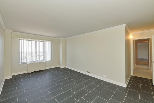 unfurnished room featuring baseboards, radiator, dark tile patterned flooring, and crown molding